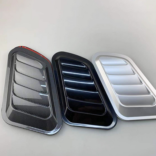 🚗 ¡50% DE DESCUENTO AHORA! 💨 Decoración universal para la rejilla de ventilación del capó del coche: material ABS, fácil instalación adhesiva y múltiples acabados 🔧